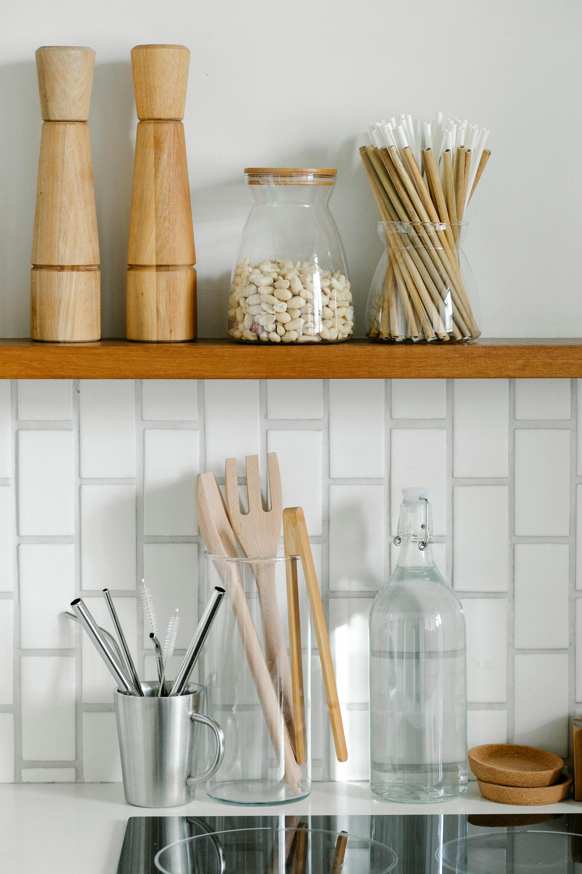 kitchen floating shelf with glass jars on top